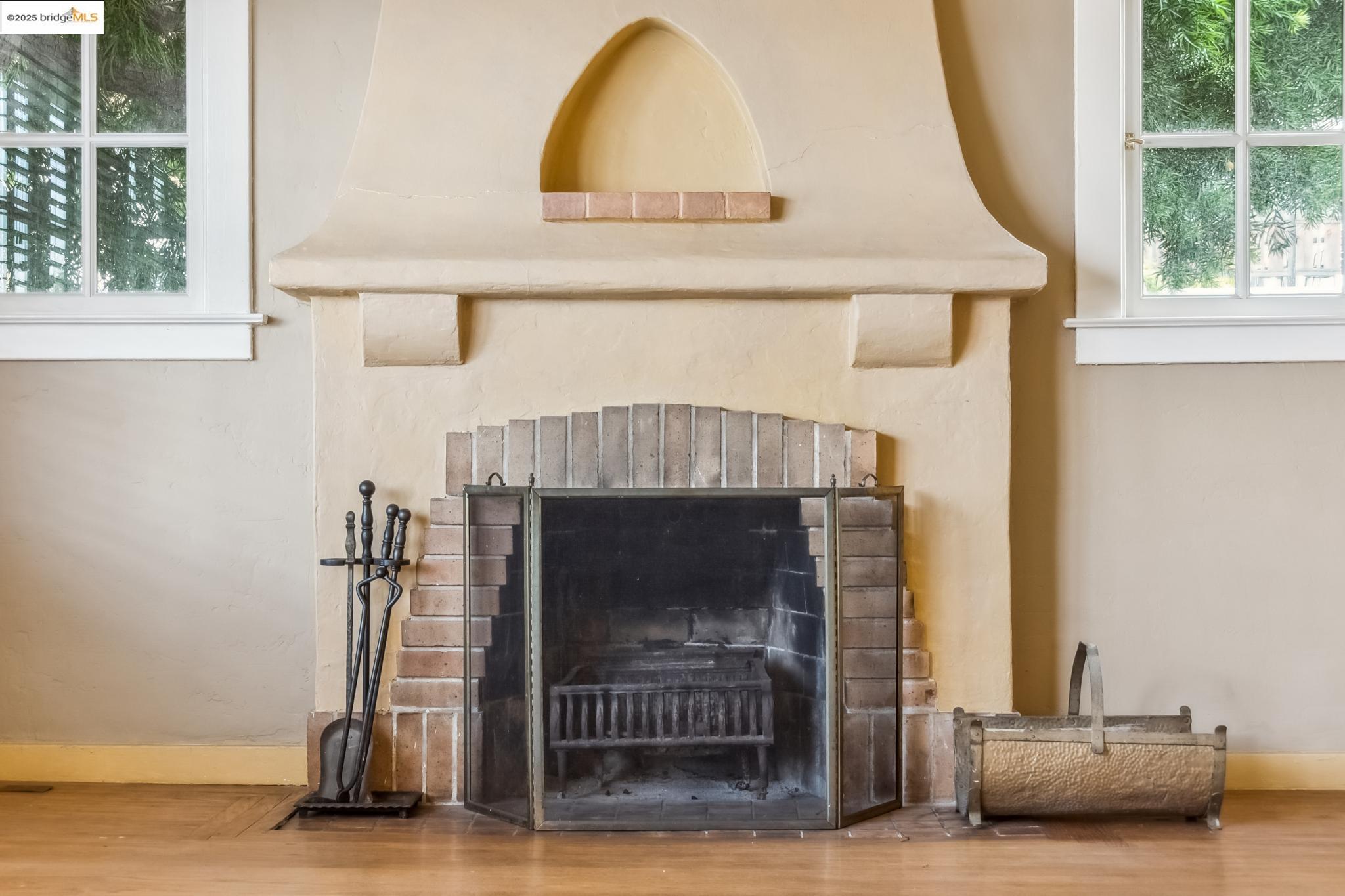 Undisclosed Address Oakland, CA 94610 - Photo 9 of 34 a living room with furniture and a fireplace