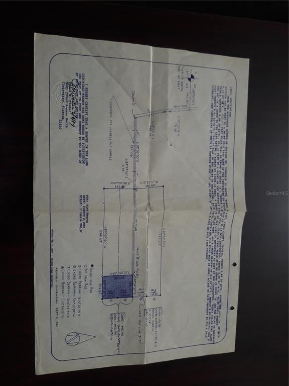 Undisclosed Address Zephyrhills, FL 33544 - Photo 4 of 5 a view of a painting of a bathroom