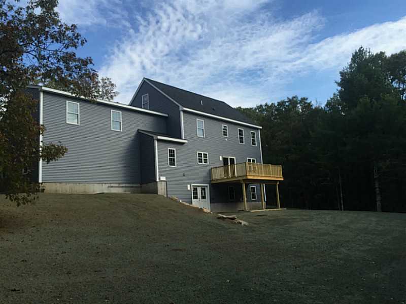 Exterior Back. BIG colonial with many future expansion possibilities.