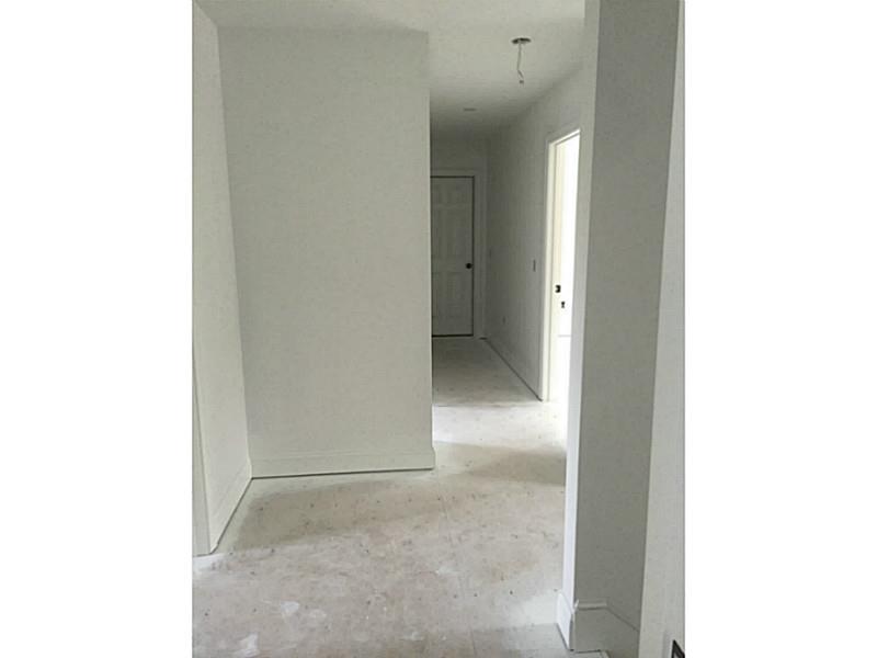 14 Shady Grove Road Hopkinton, RI 02832 - Photo 12 of 23 Other. Standing at master bedroom suite door, stairway downstairs to right, hallway and door to bonus room straight ahead