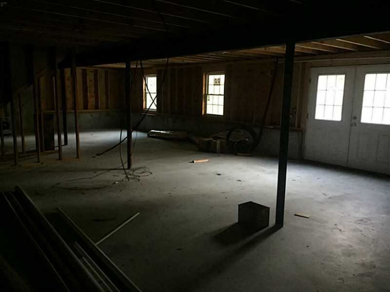 14 Shady Grove Road Hopkinton, RI 02832 - Photo 21 of 23 Cellar or Basement. Full walkout basement with 2 windows and double opening door for future expansion