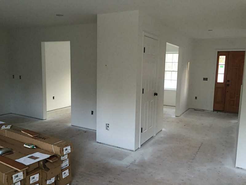 14 Shady Grove Road Hopkinton, RI 02832 - Photo 6 of 23 View. View from sliding glass door, front door straight ahead, kitchen to left, 2 entrances to dining/study/or office