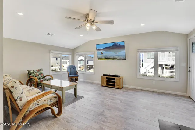 a kitchen with stainless steel appliances a stove a refrigerator and cabinets
