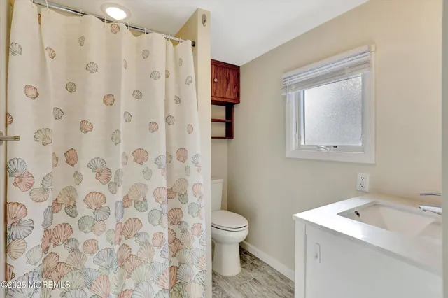 a view of a chairs and table in a patio