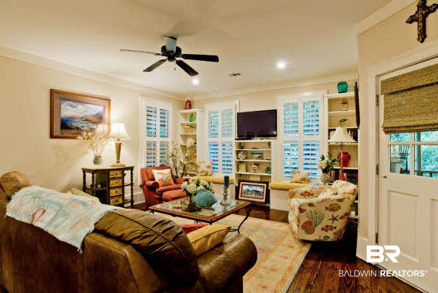 25773 Canal Road, Unit 26 Orange Beach, AL 36561 - Photo 13 of 42 Custom wood shutters let in the light to this great space