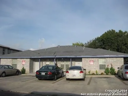 a car parked in front of a building