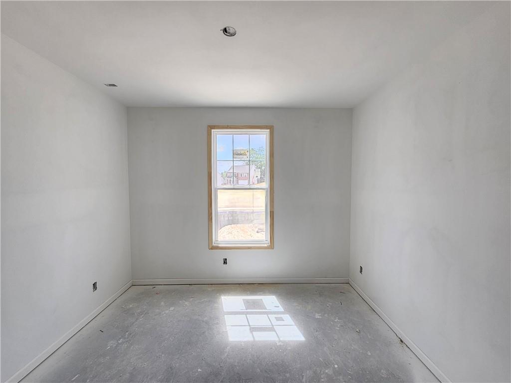 30 Silverleaf Trail Bethlehem, GA 30620 - Photo 5 of 55 an empty room with a window