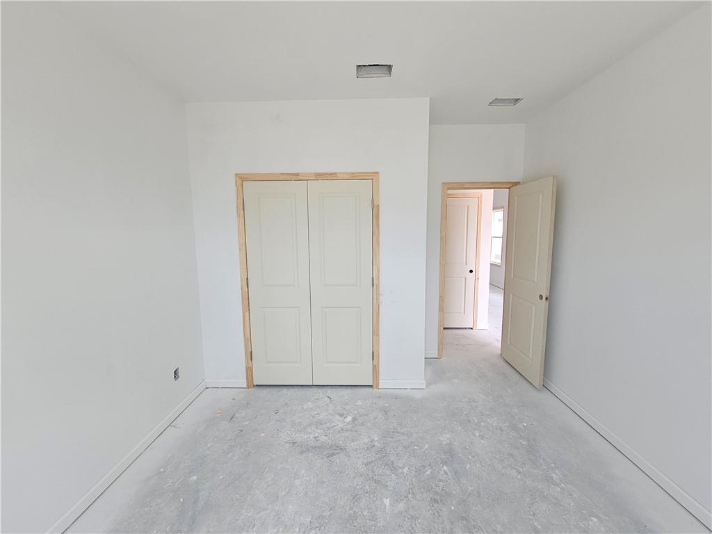 30 Silverleaf Trail Bethlehem, GA 30620 - Photo 6 of 55 a view of an empty room and closet area