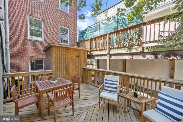 a view of a chairs on the deck