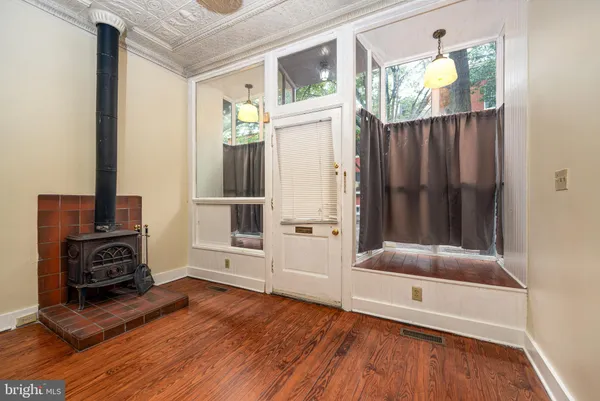 a view of livingroom with furniture and wooden floor