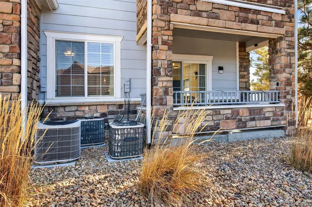 front view of a house with a large window
