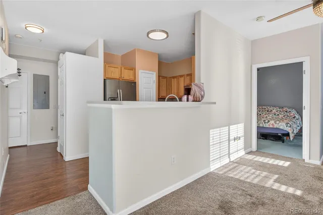 a view of bedroom with furniture and closet