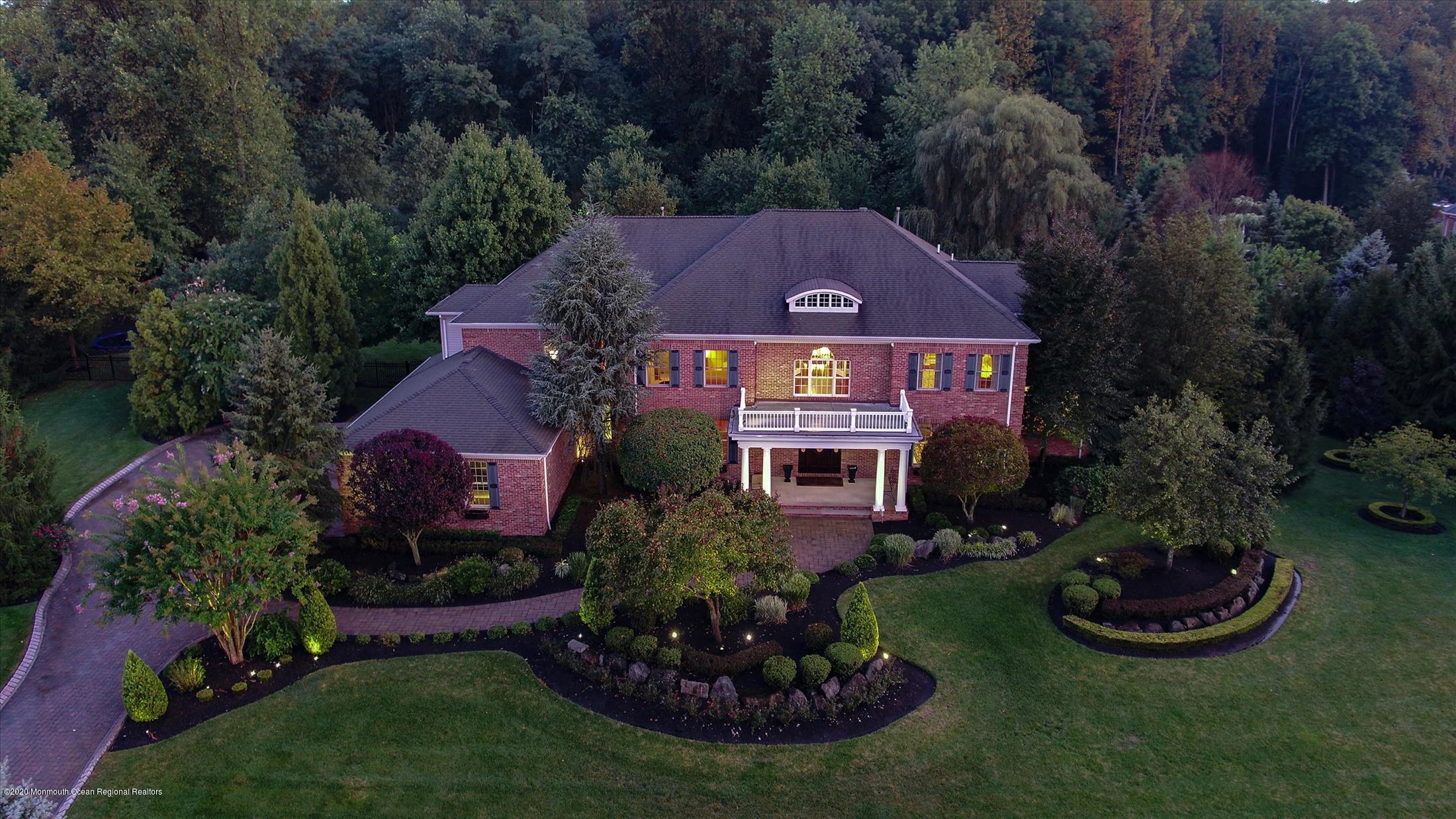 8 Maple Leaf Drive Holmdel, NJ 07733 - Photo 2 of 74 an aerial view of a house