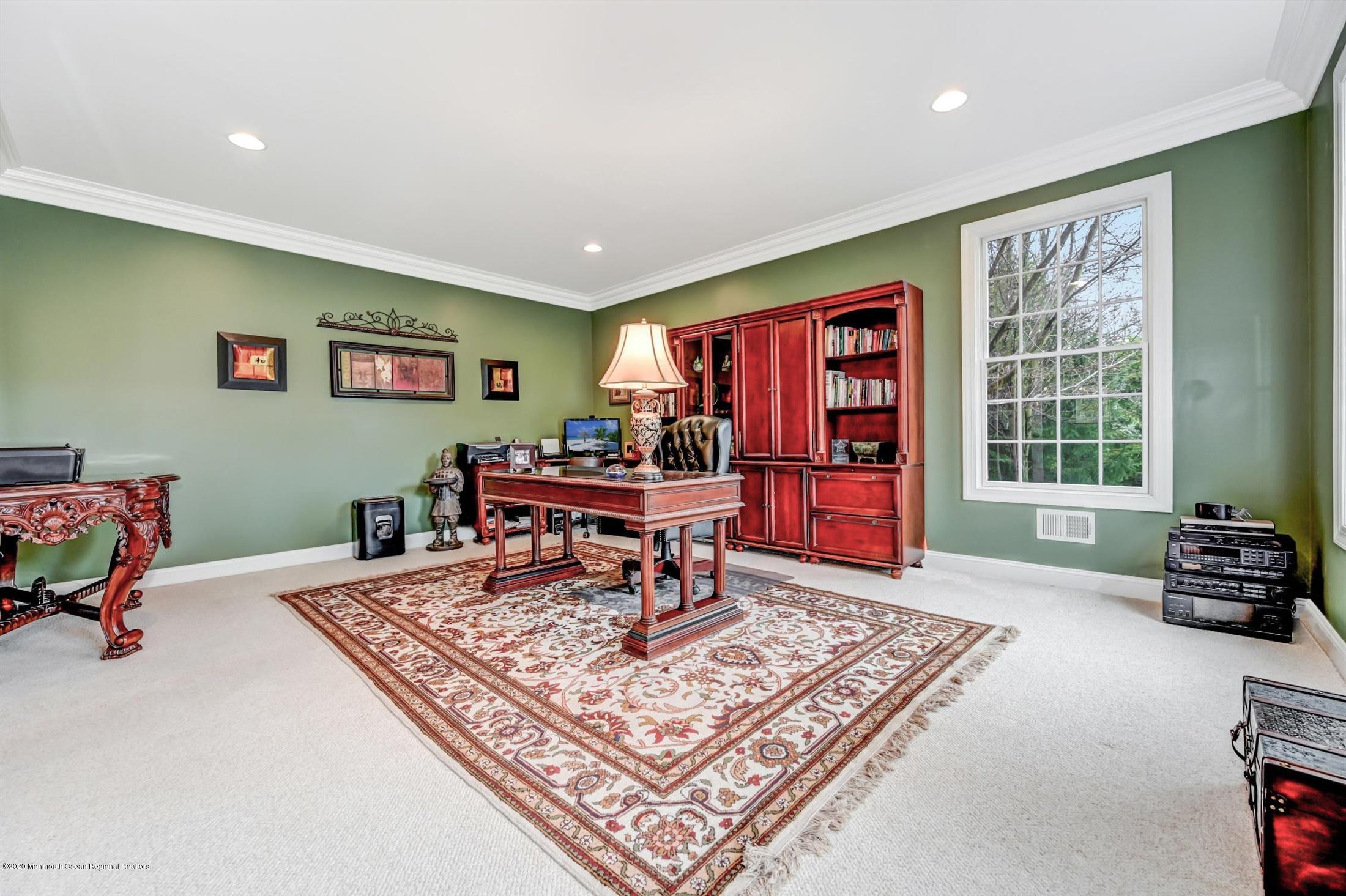 8 Maple Leaf Drive Holmdel, NJ 07733 - Photo 27 of 74 a living room with furniture and a rug