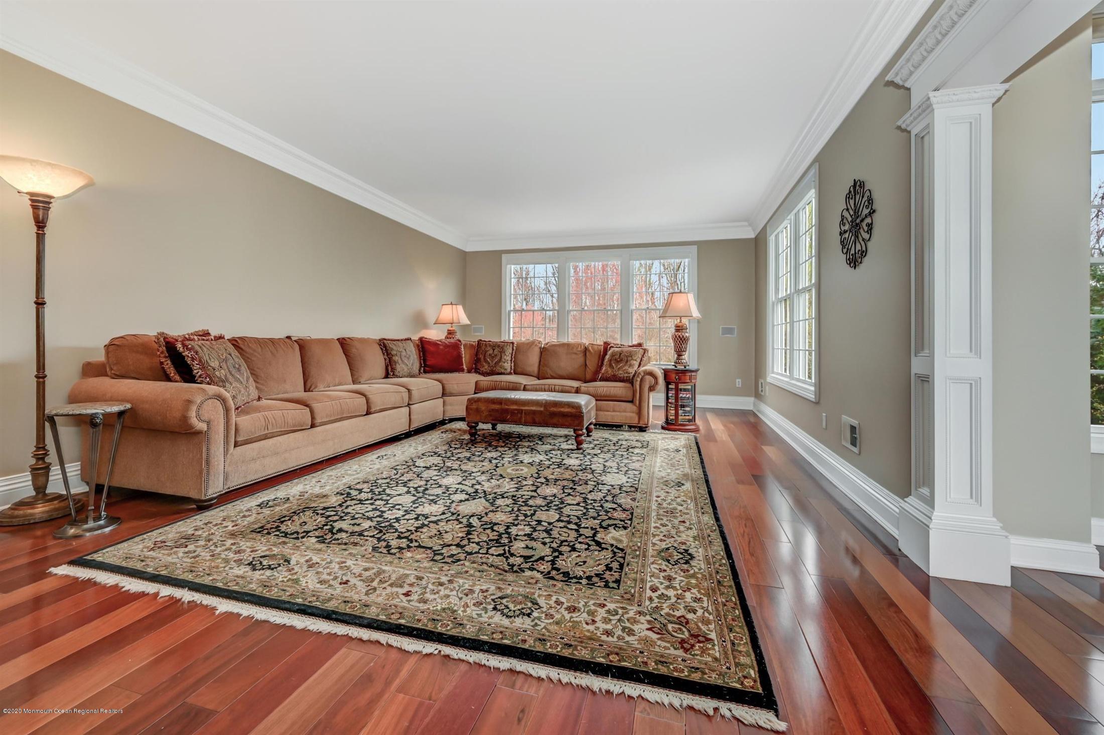 8 Maple Leaf Drive Holmdel, NJ 07733 - Photo 28 of 74 a living room with furniture and a rug