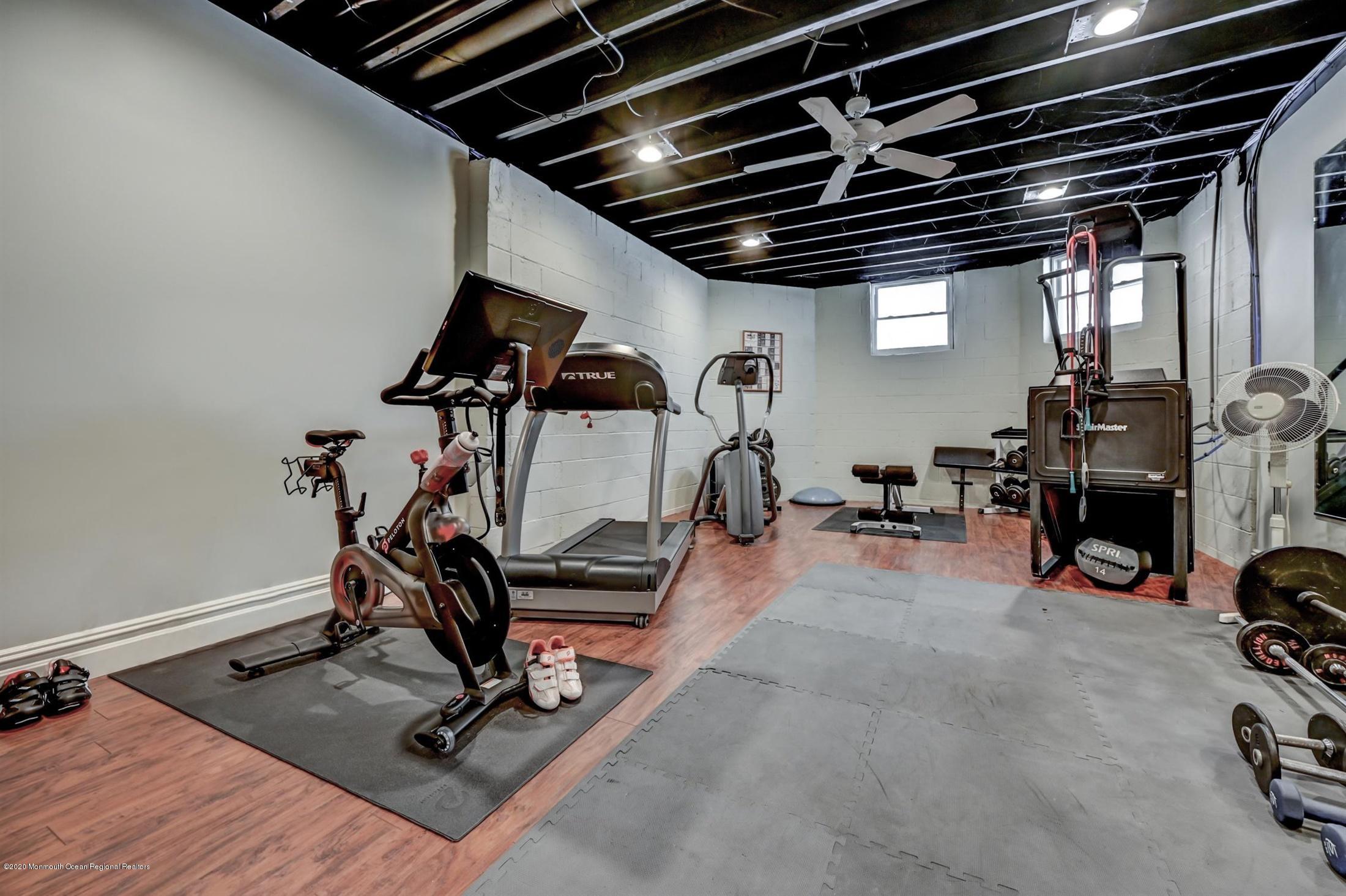 8 Maple Leaf Drive Holmdel, NJ 07733 - Photo 57 of 74 a view of a room with gym equipment