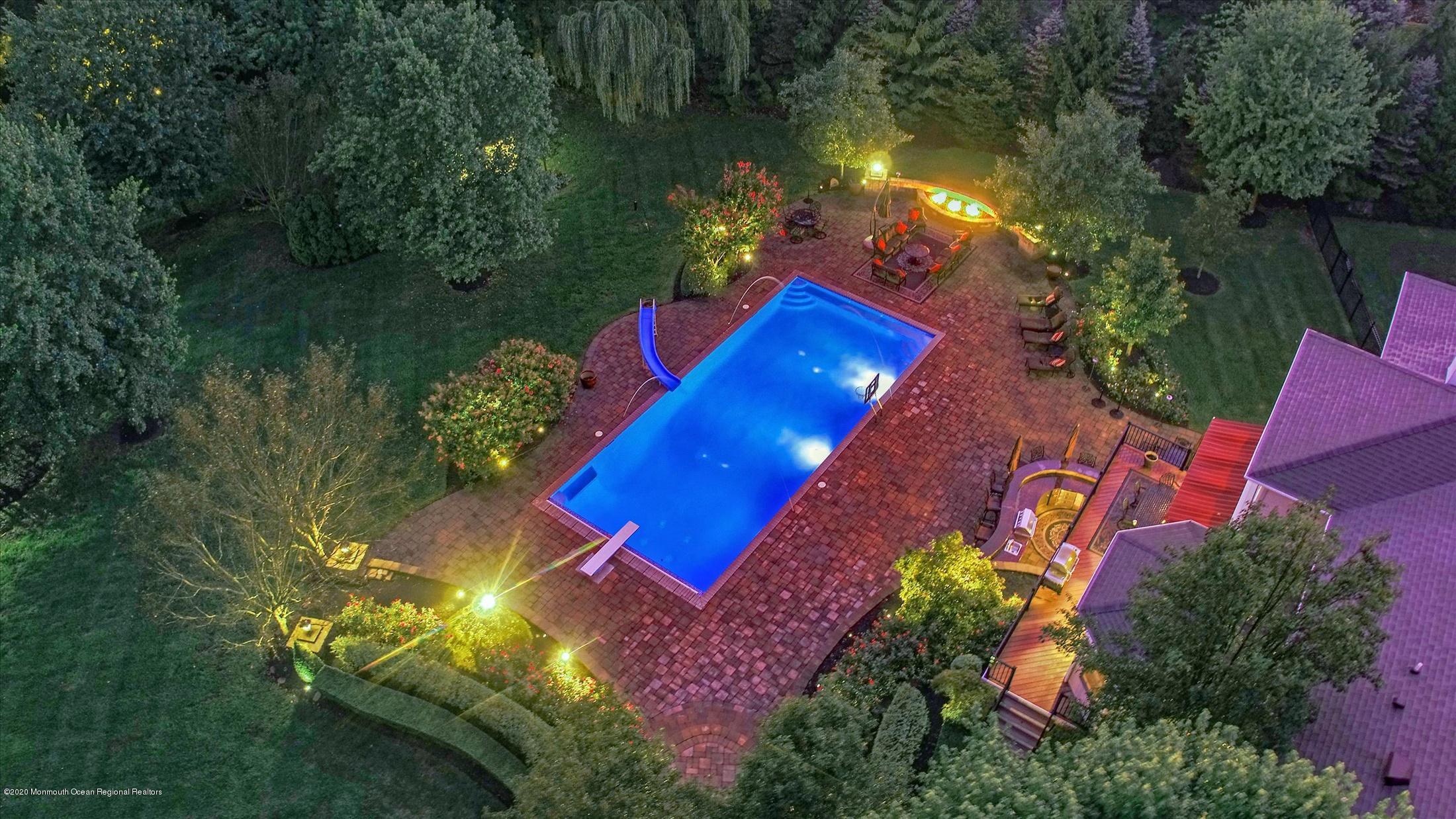 8 Maple Leaf Drive Holmdel, NJ 07733 - Photo 61 of 74 an aerial view of a house swimming pool outdoor seating and yard