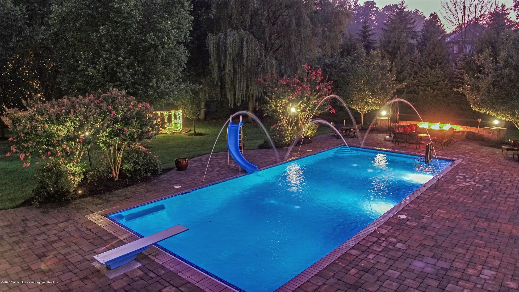 8 Maple Leaf Drive Holmdel, NJ 07733 - Photo 68 of 74 a view of a backyard