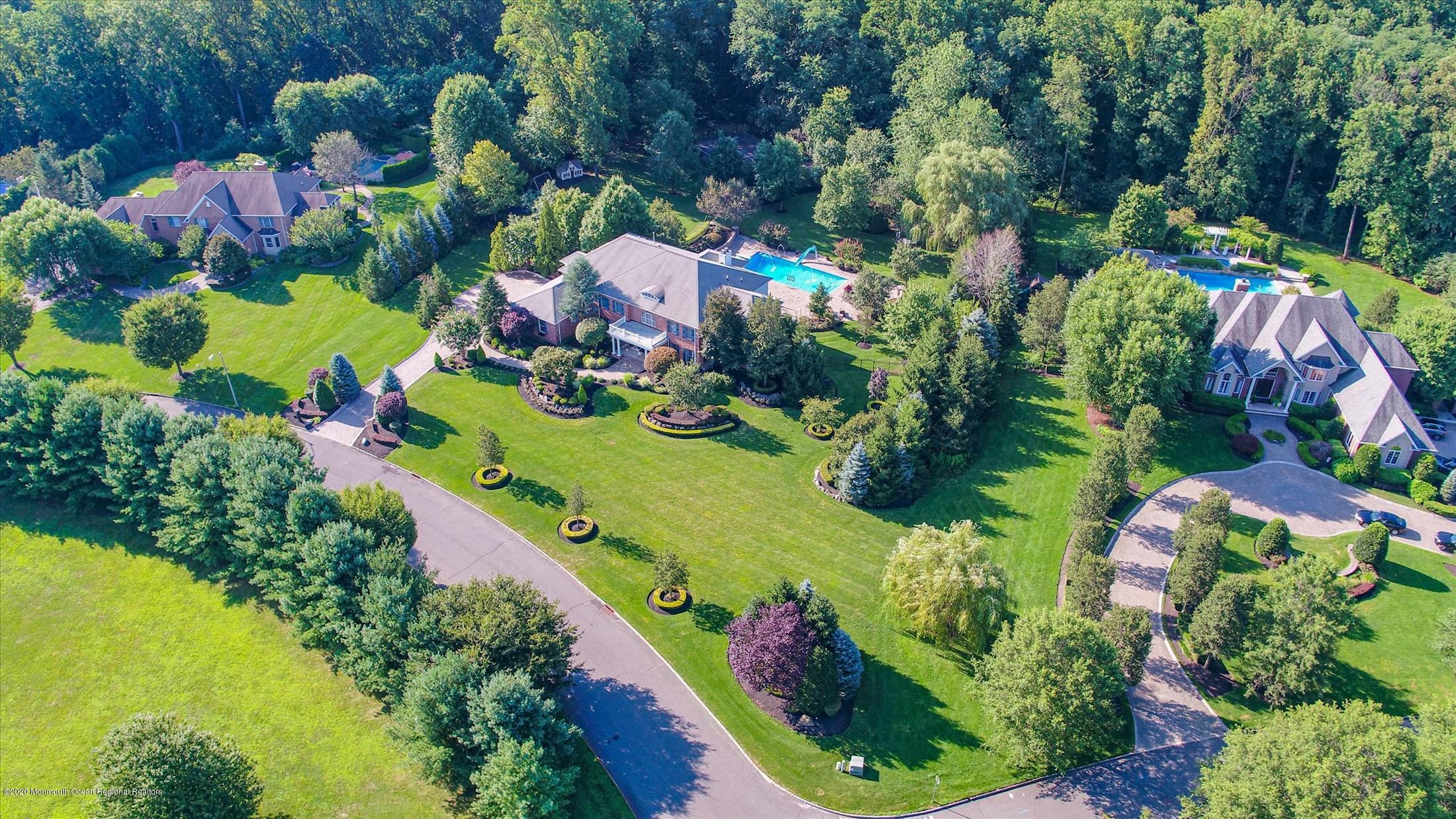 8 Maple Leaf Drive Holmdel, NJ 07733 - Photo 70 of 74 a bunch of flowers are in a garden