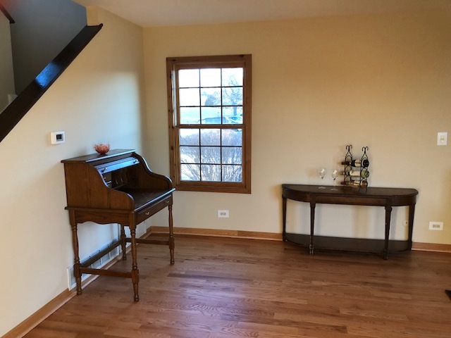 611 Dunham Road Gurnee, IL 60031 - Photo 4 of 15 a living room with furniture and a window