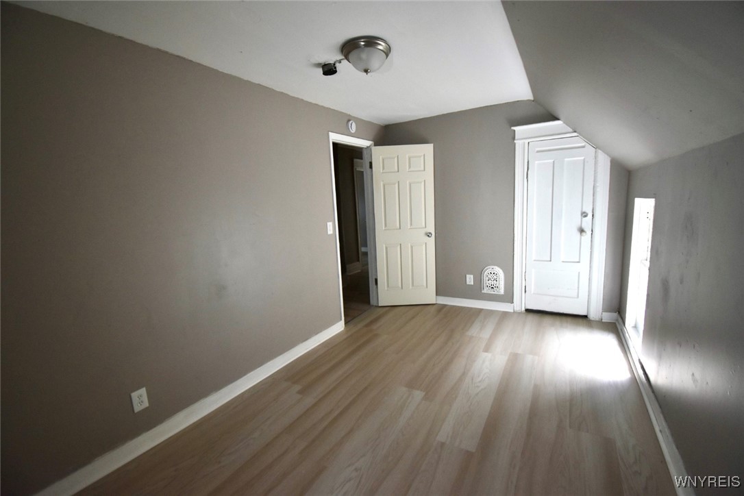 280 Ave D Rochester, NY 14621 - Photo 15 of 21 Rear bedroom that has access to the full attic