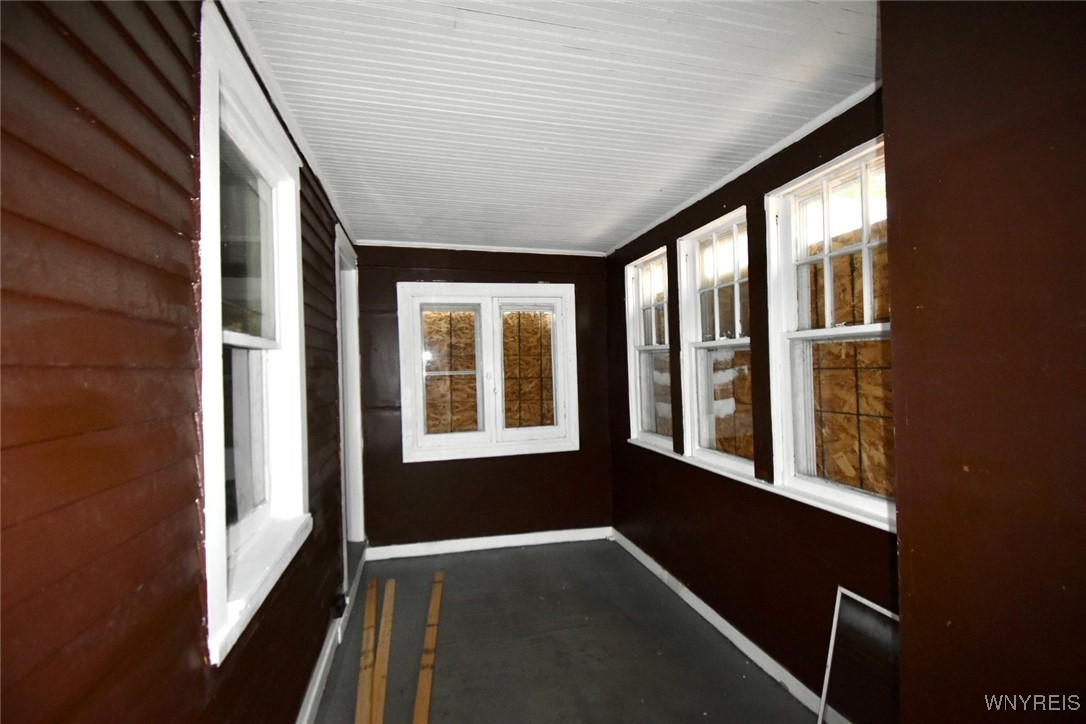 280 Ave D Rochester, NY 14621 - Photo 9 of 21 Side enclosed porch
