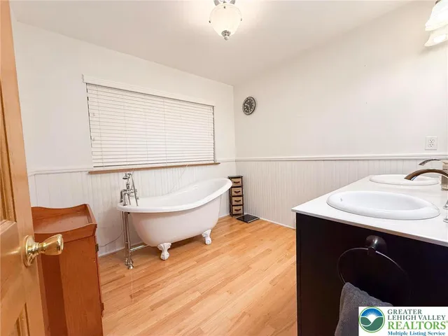 a bathroom with a toilet and a sink