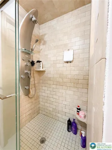 a view of an empty room and a window