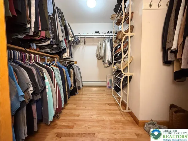 a house that has a tree in front of it