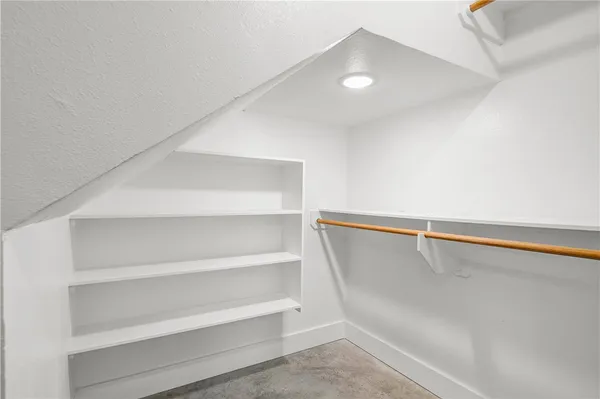a view of an empty walk in closet