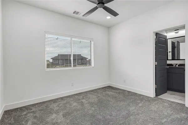 a view of empty room with windows