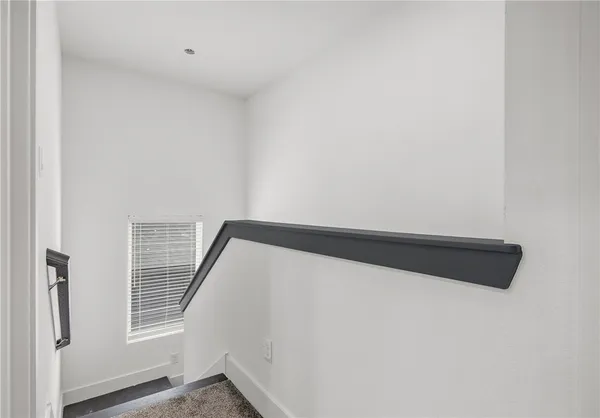 a view of walk in closet with window