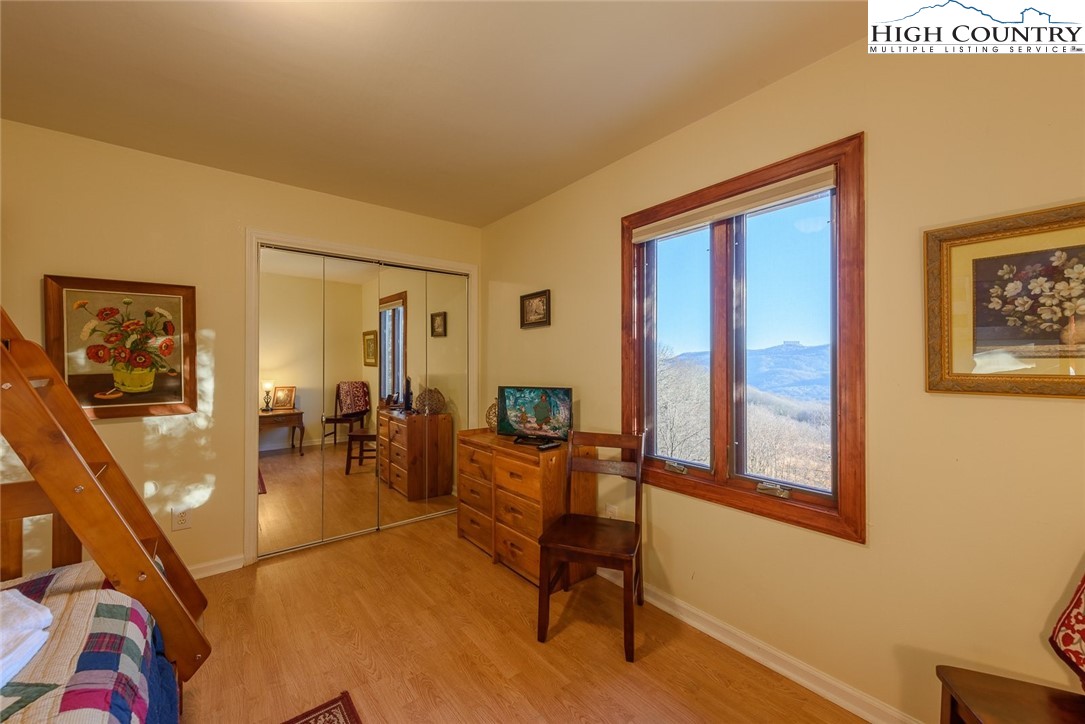 1776 Beech Mountain Parkway Beech Mountain, NC 28604 - Photo 23 of 34 a view of a livingroom with furniture and workspace