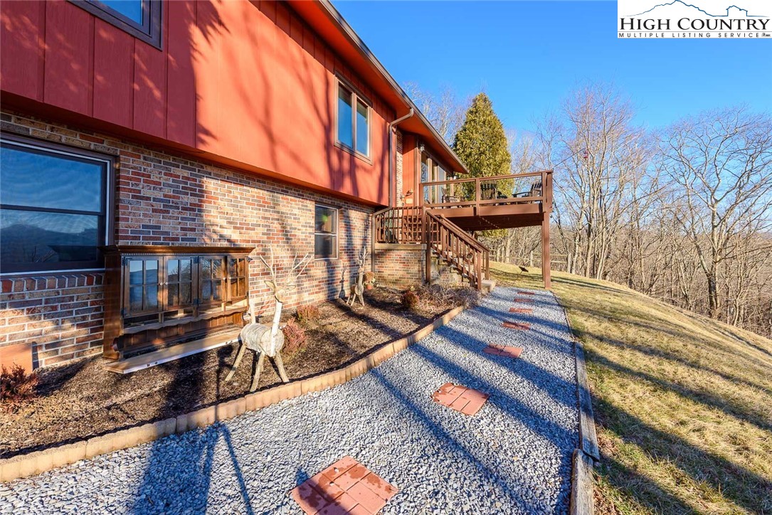 1776 Beech Mountain Parkway Beech Mountain, NC 28604 - Photo 32 of 34 a view of a house with a street