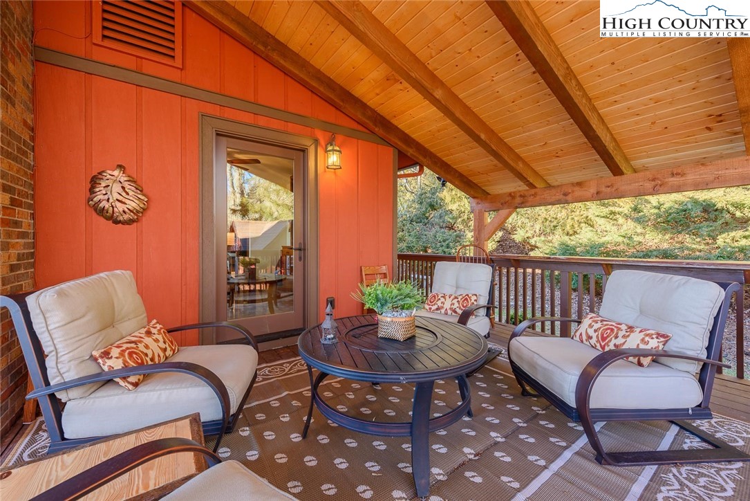 1776 Beech Mountain Parkway Beech Mountain, NC 28604 - Photo 34 of 34 a outdoor living room with furniture