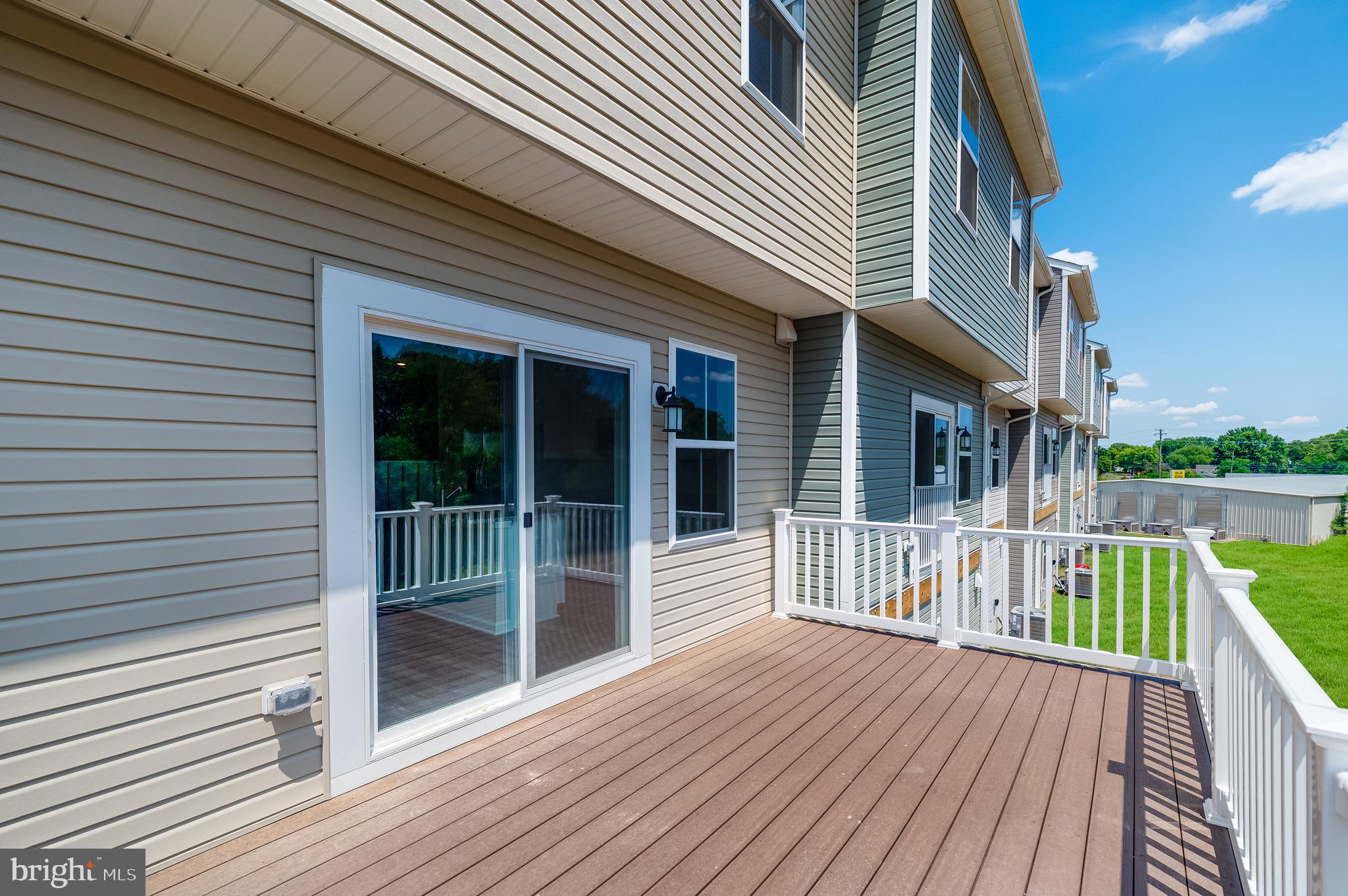 410 18th Avenue Ranson, WV 25438 - Photo 25 of 26 a view of a house with a wooden deck