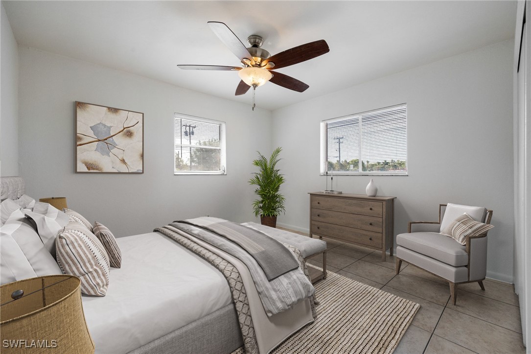 12955 First Street Fort Myers, FL 33905 - Photo 16 of 48 a bedroom with a bed and furniture