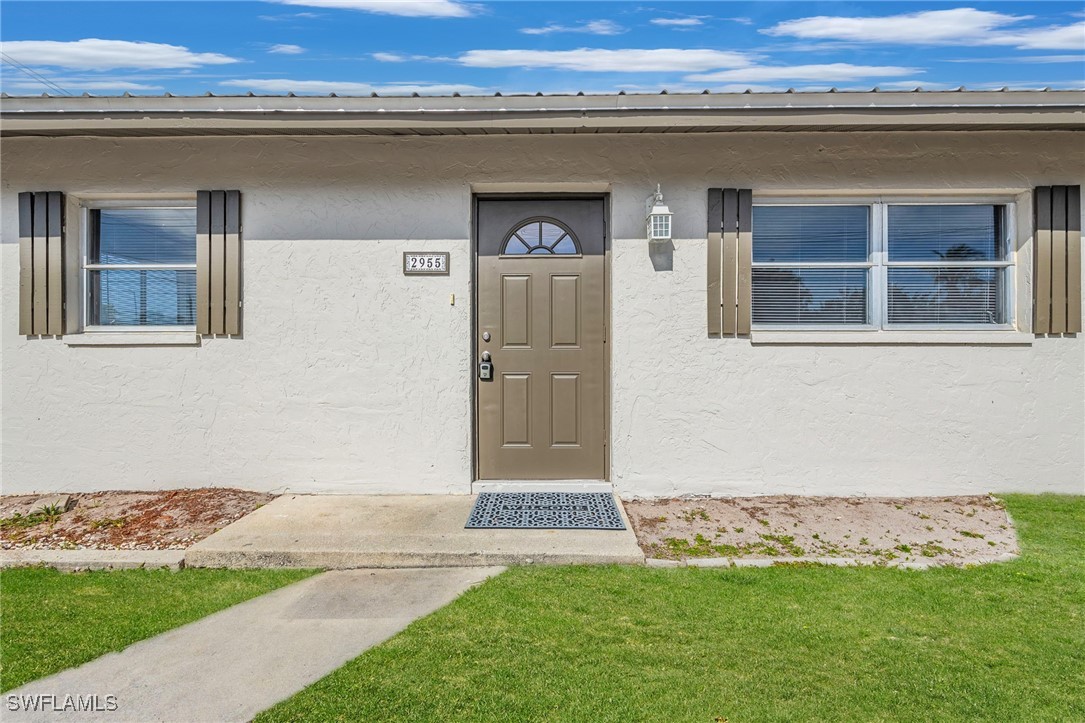 12955 First Street Fort Myers, FL 33905 - Photo 22 of 48 a view of front door of house