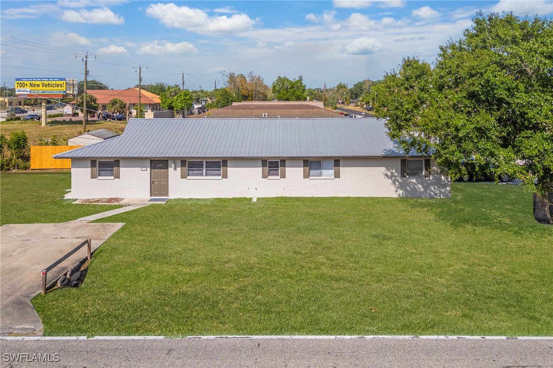 12955 First Street Fort Myers, FL 33905 - Photo 23 of 48 a aerial view of a house with a garden