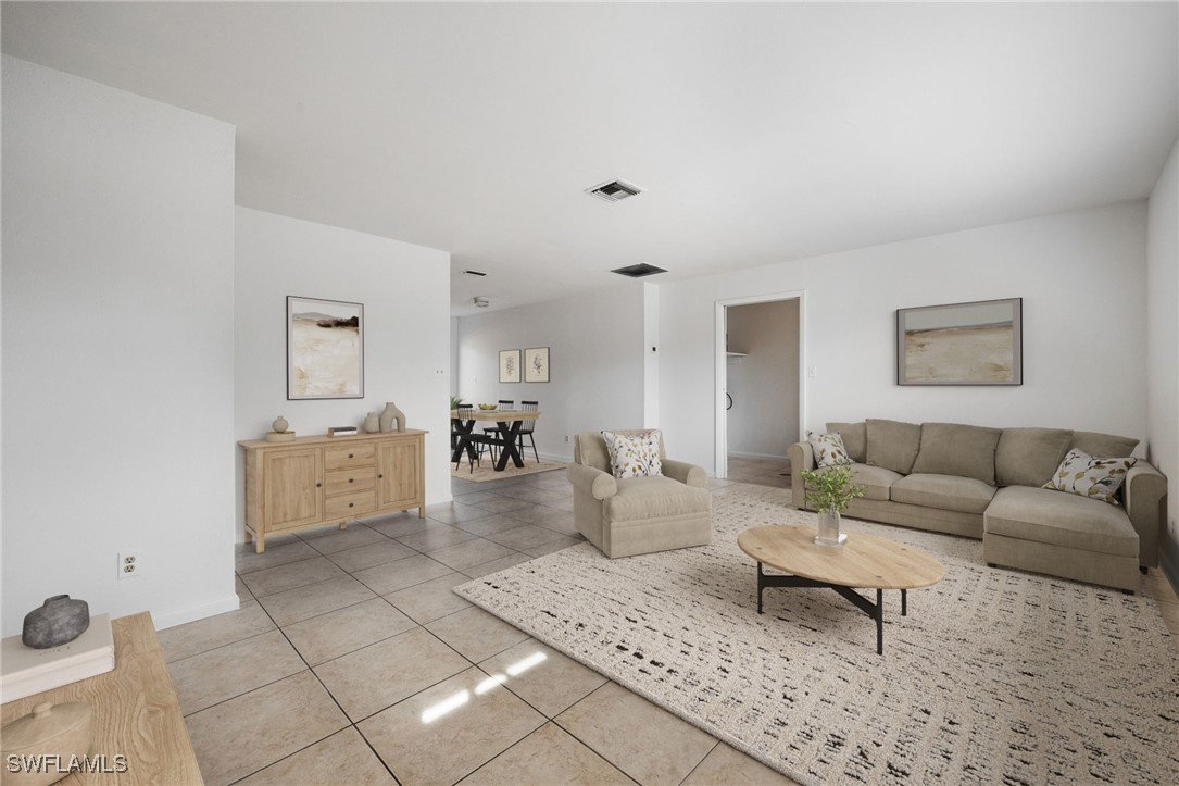 12955 First Street Fort Myers, FL 33905 - Photo 3 of 48 a living room with furniture and a couch