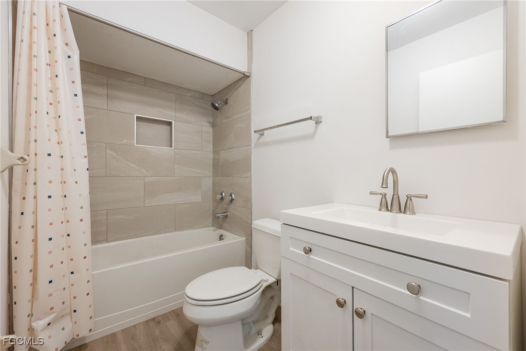 12955 First Street Fort Myers, FL 33905 - Photo 34 of 48 a bathroom with a sink a toilet and shower