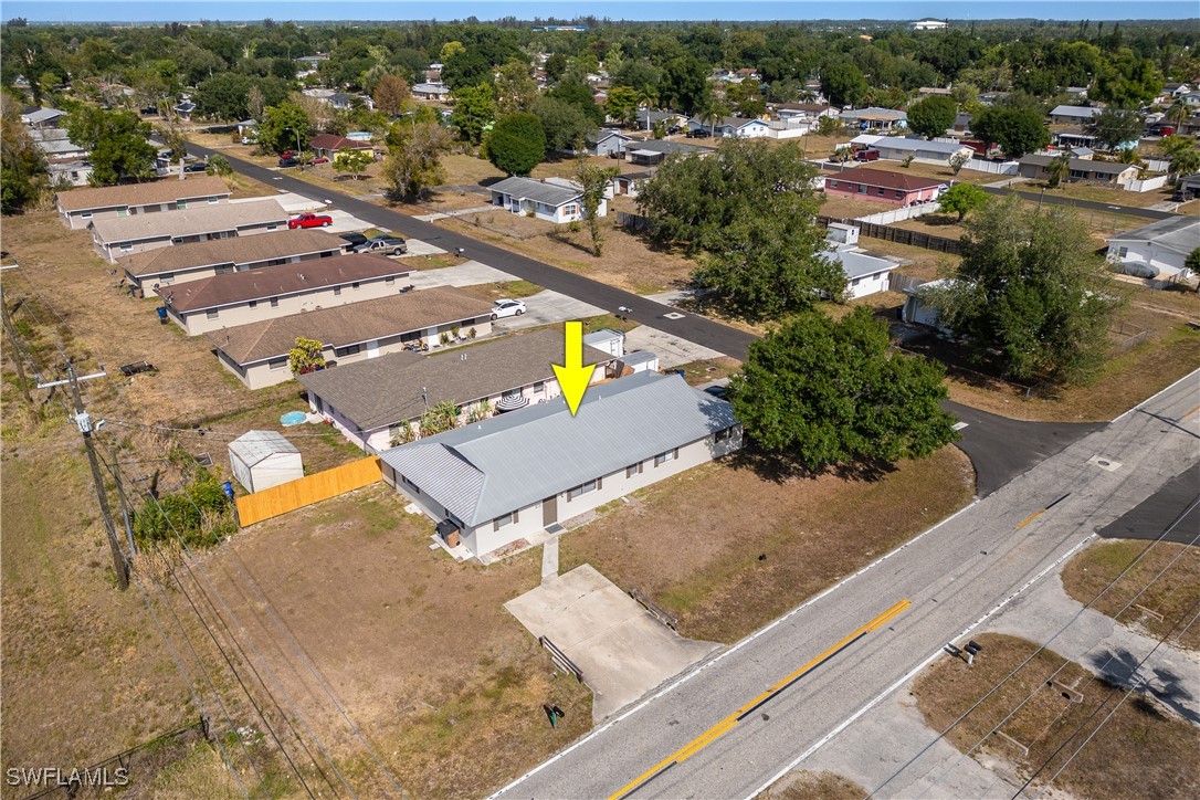 12955 First Street Fort Myers, FL 33905 - Photo 37 of 48 an aerial view of residential houses with outdoor space