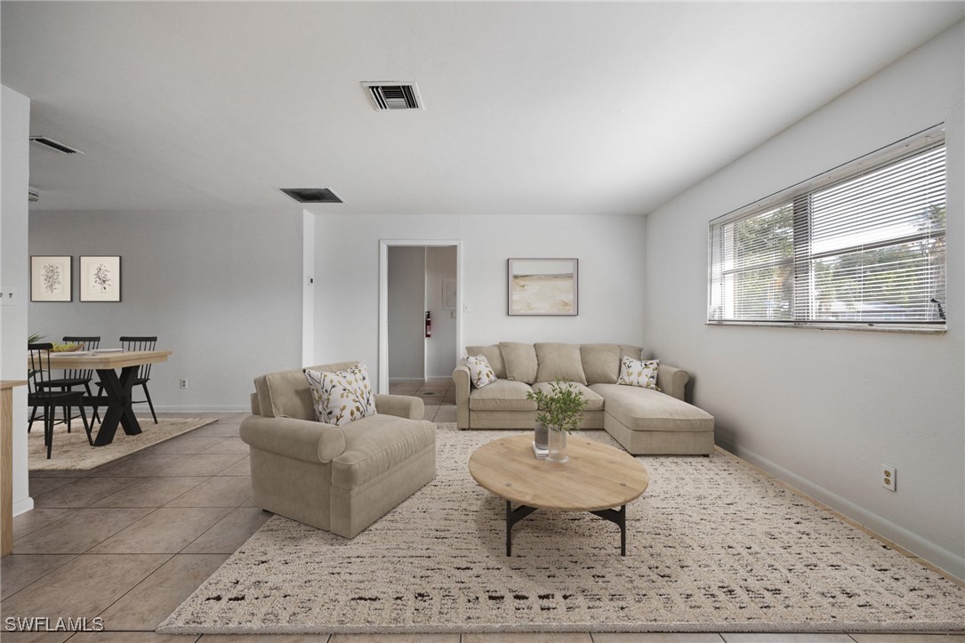12955 First Street Fort Myers, FL 33905 - Photo 4 of 48 a living room with furniture and a rug