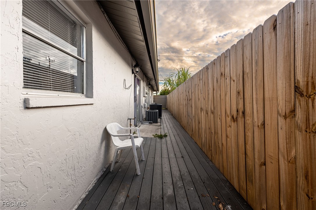 12955 First Street Fort Myers, FL 33905 - Photo 48 of 48 a balcony with wooden floor
