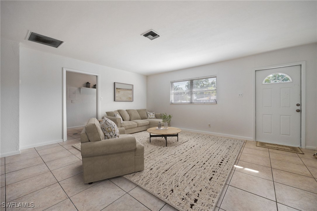 12955 First Street Fort Myers, FL 33905 - Photo 5 of 48 a living room with furniture and a window