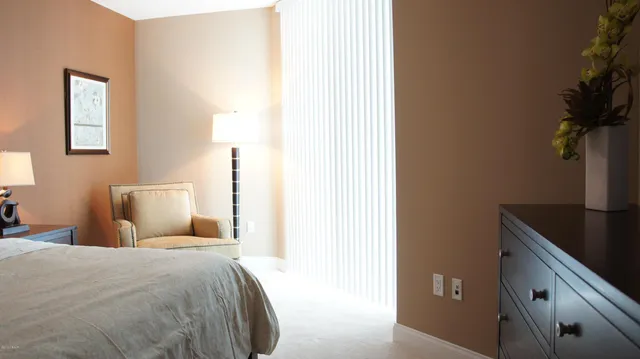 a bathroom with a tub and shower