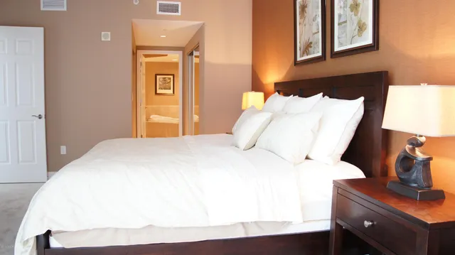 a bathroom with a tub and shower