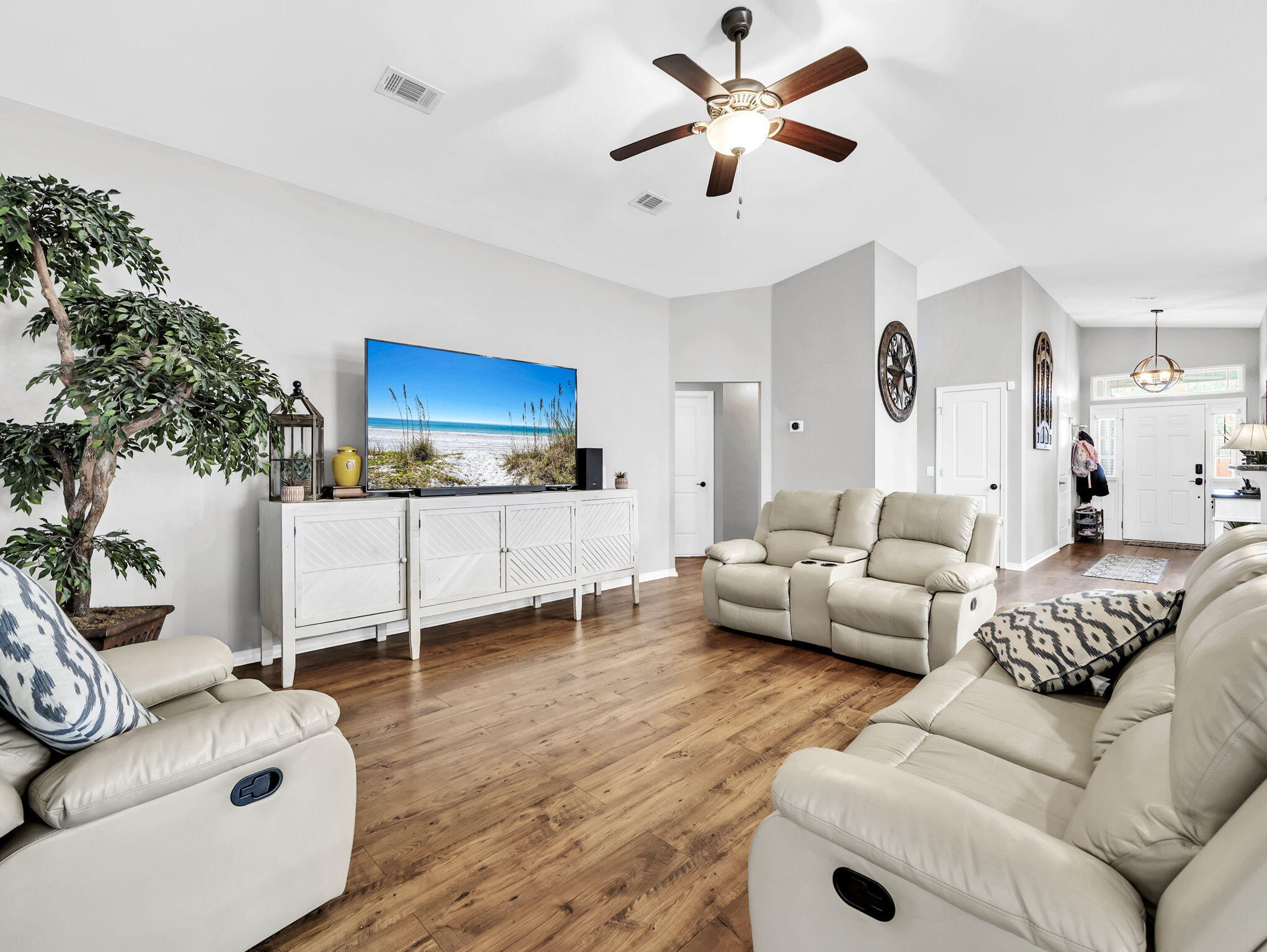 9119 Timber Lane Navarre, FL 32566 - Photo 24 of 53 a living room with furniture and a large window