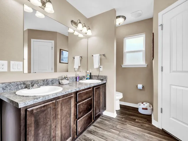a bathroom with a shower and a mirror