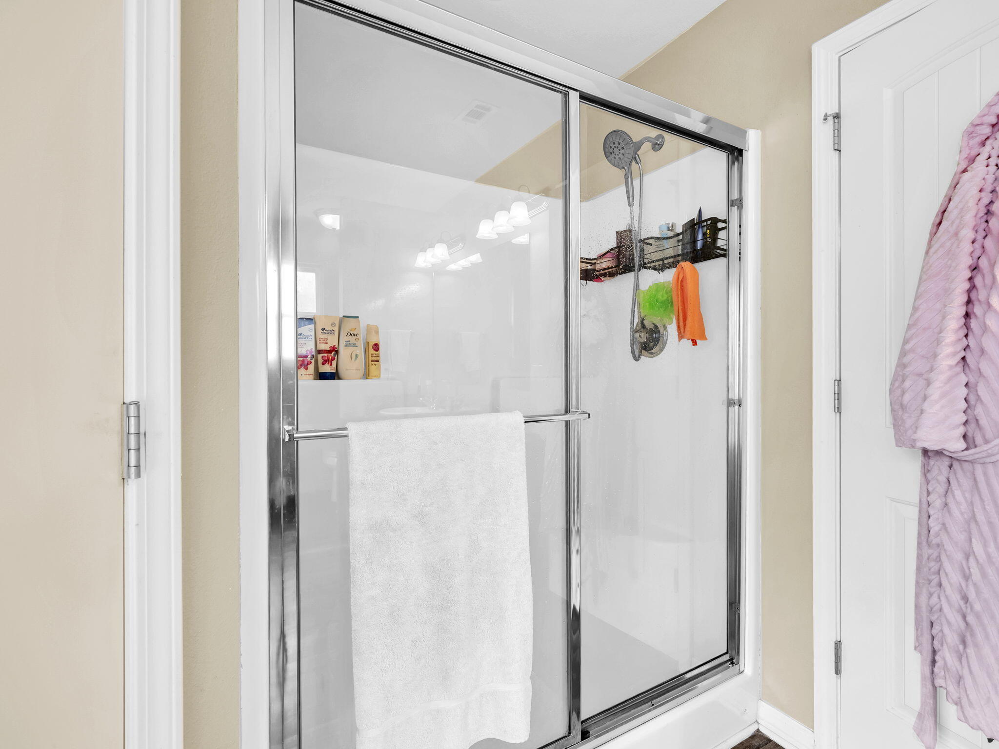 9119 Timber Lane Navarre, FL 32566 - Photo 34 of 53 a bathroom with a shower and a mirror